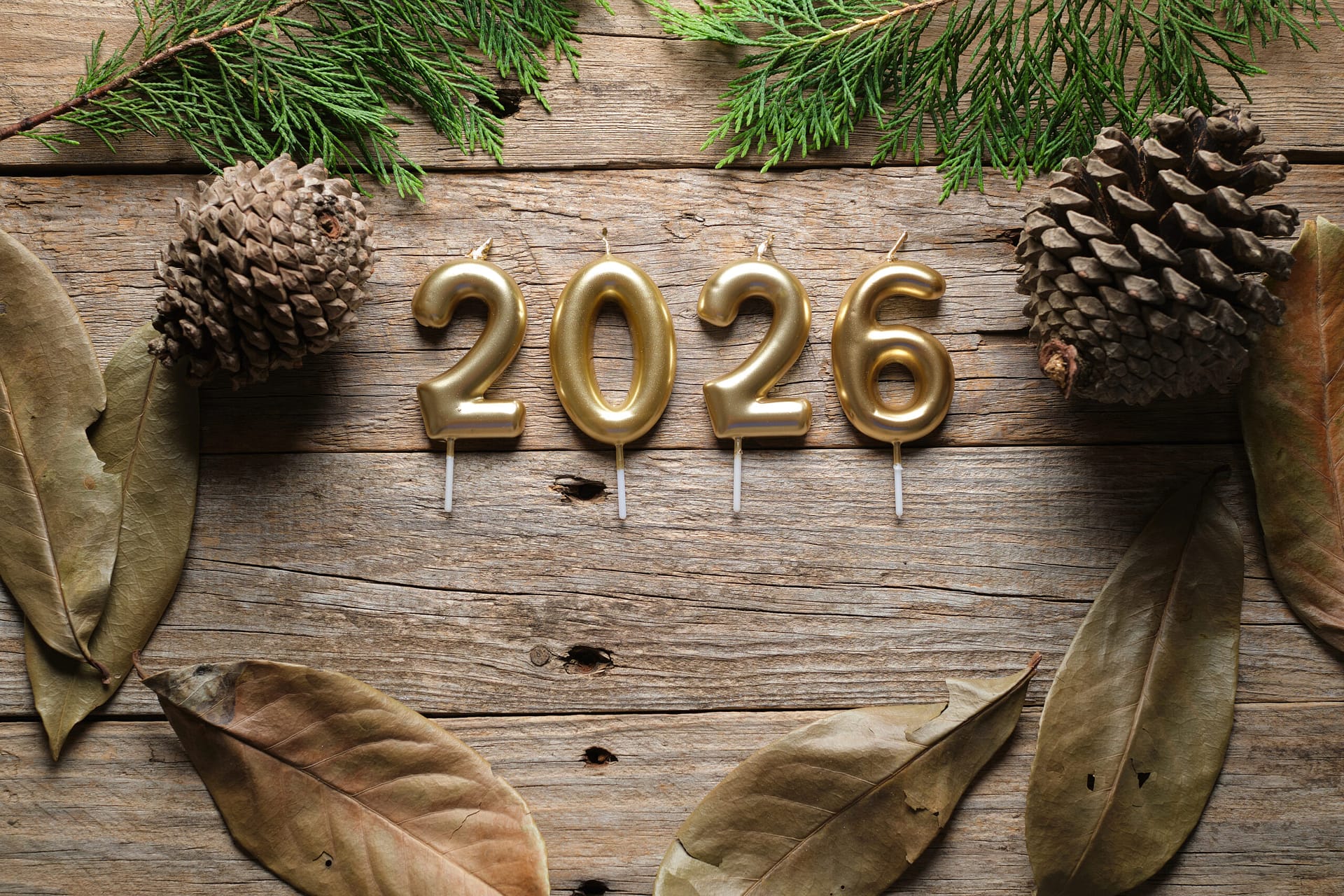 Decorative Candles Arranged With Natural Elements for New Year Celebration